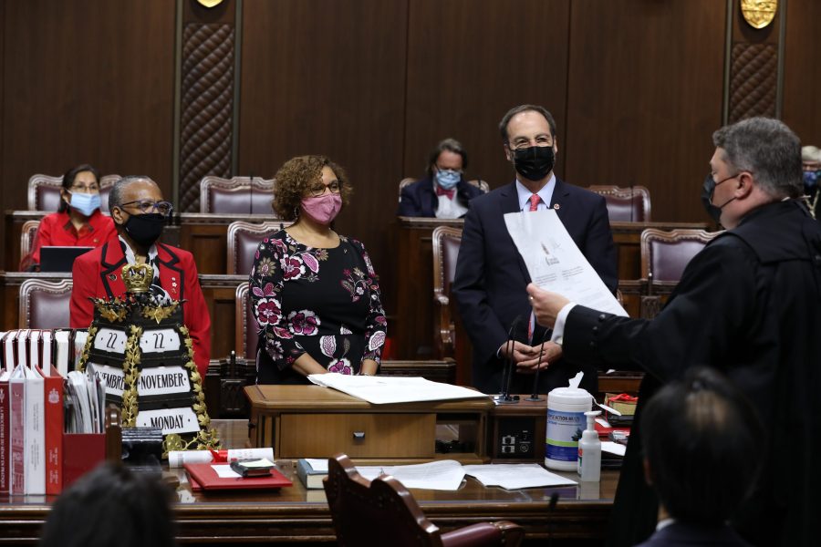 Senator Bernadette Clement (centre) is sworn in on November 22, 2021 in the Red Chamber aside Senator Wanda Thomas Bernard (left) and Senator Marc Gold (right).